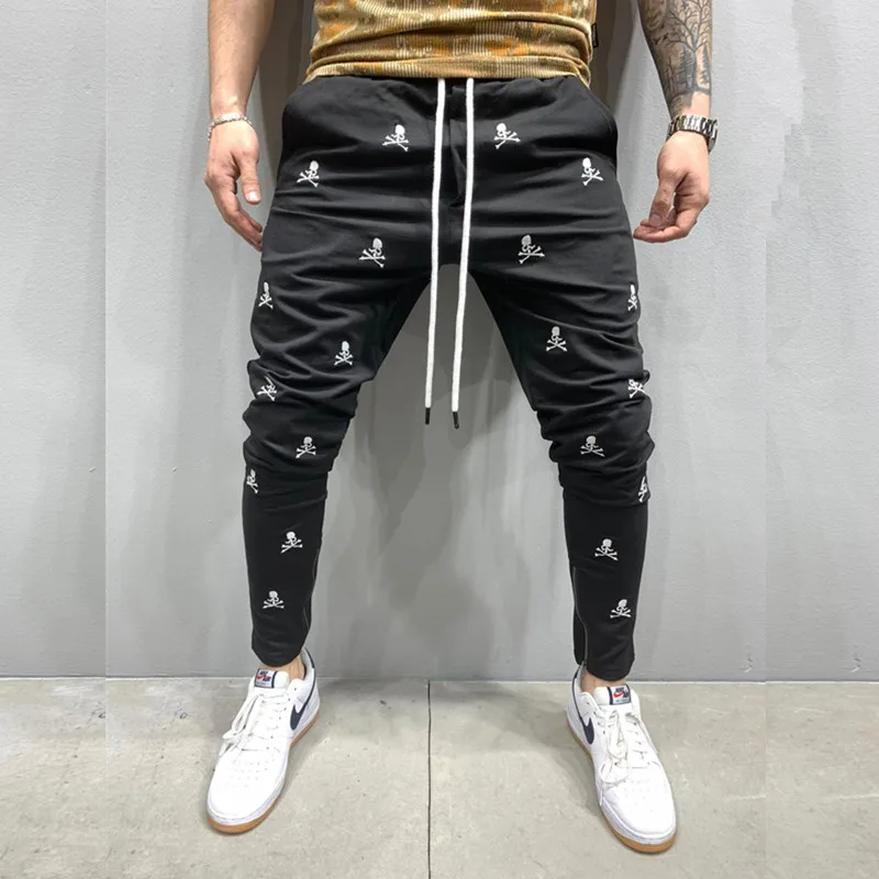 Новые мужские тактические черные брюки для бега трусцой в стиле харадзюку с вышивкой в виде черепа, узкие повседневные брюки, мужские спортивные брюки в стиле хип-хоп на молнии 바지